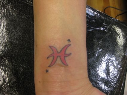 Pisces Symbol Tats On Wrist